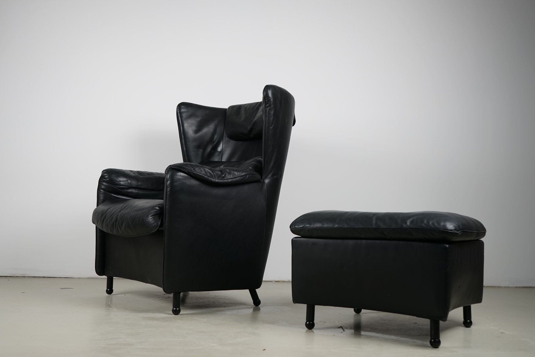 DS-23 Black Leather Chair & Ottoman by Josef Schulte for de Sede, 1980s, Set of 2