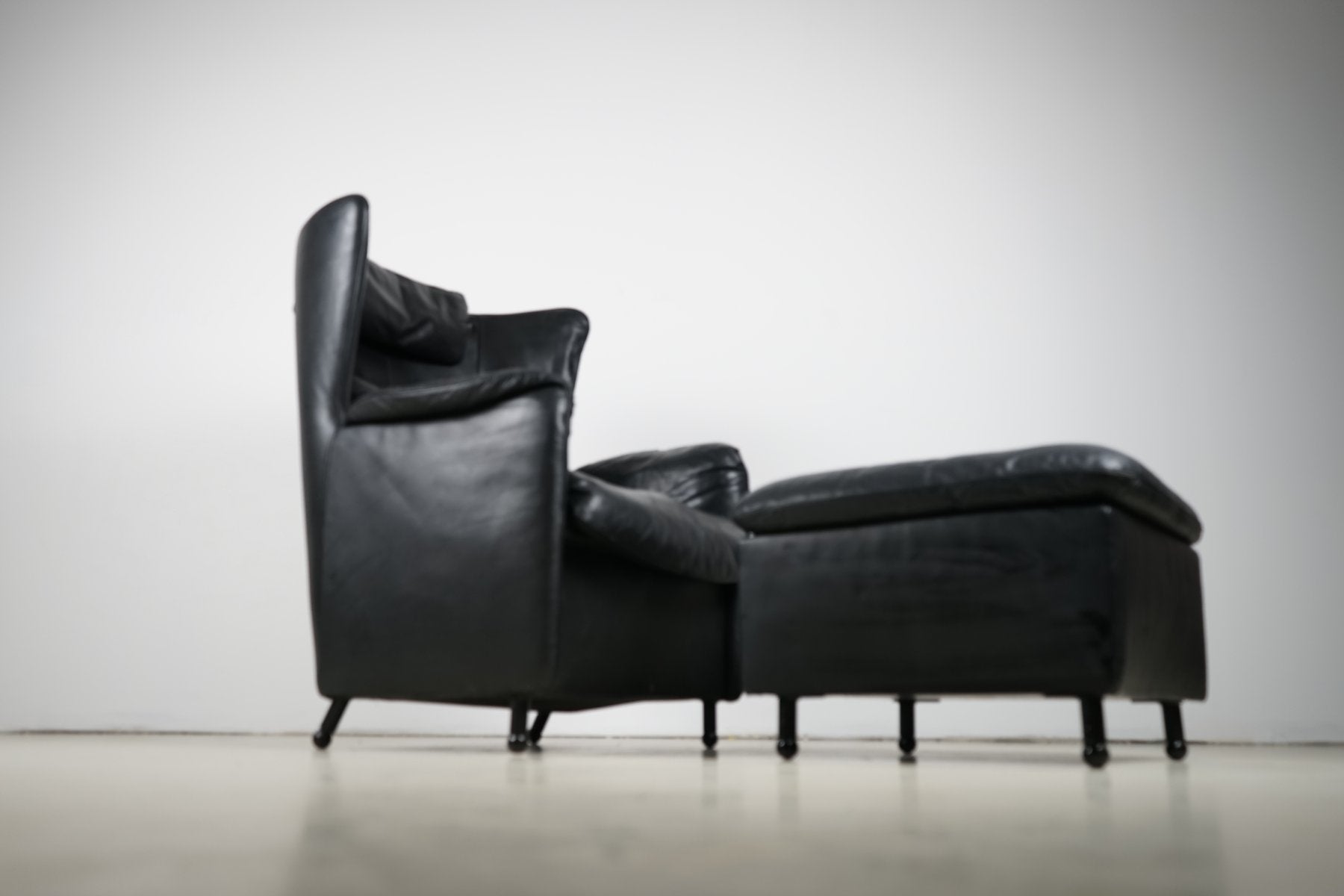 DS-23 Black Leather Chair & Ottoman by Josef Schulte for de Sede, 1980s, Set of 2