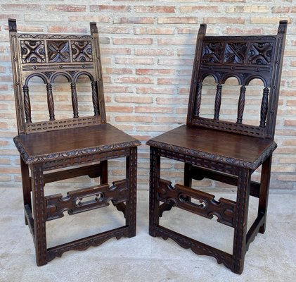 Early 20th Century Spanish Carved Chairs with Wood Seat, 1890s, Set of 2-NOU-1730514