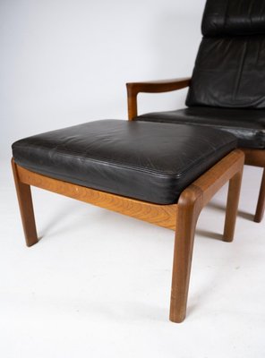 Easy Chair with Stool in Teak Upholstered with Black Leather by Arne Vodder for Komfort, Set of 2-UY-911719