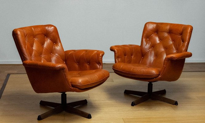 Eva Swivel Chairs in Cognac Leather attributed to Göte Möbler Nässjö, Sweden, 1960s, Set of 2-JE-1773322