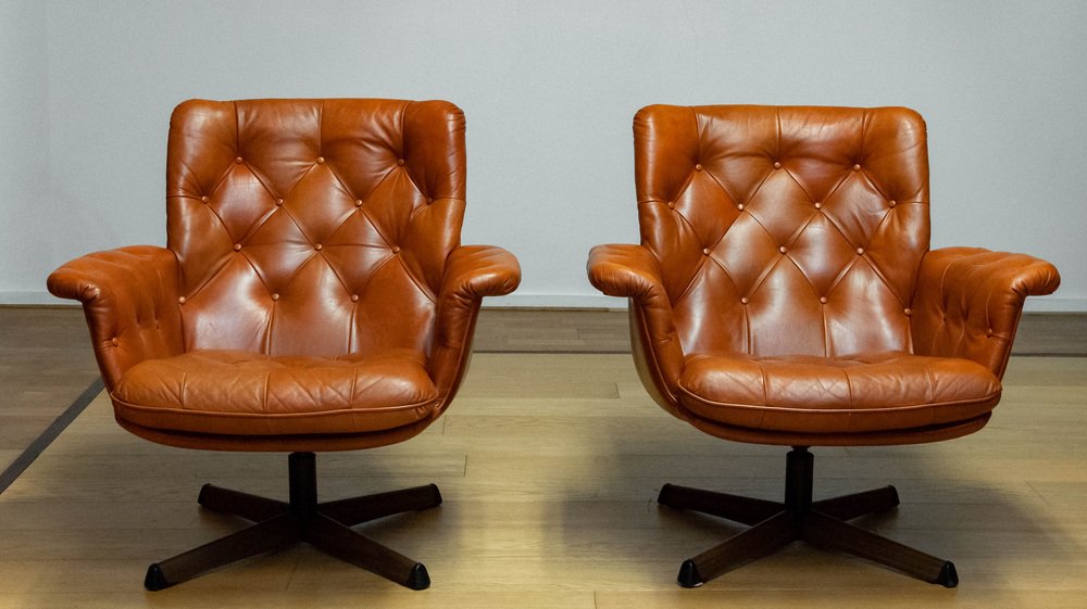 Eva Swivel Chairs in Cognac Leather attributed to Göte Möbler Nässjö, Sweden, 1960s, Set of 2