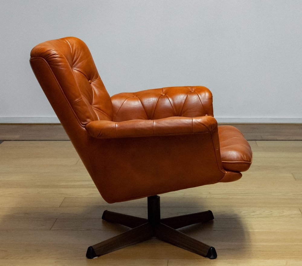 Eva Swivel Chairs in Cognac Leather attributed to Göte Möbler Nässjö, Sweden, 1960s, Set of 2