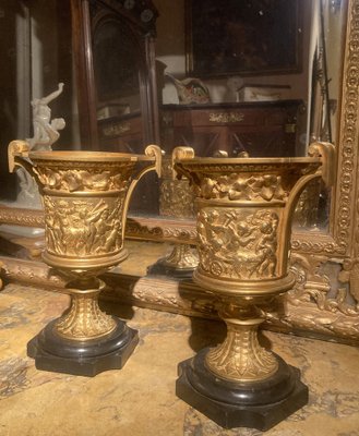 French 18th Century Louis XVI Ormolu Vases with Handles and Relief Putto on Black Belgian Marble Bases, Set of 2-AXE-1720640