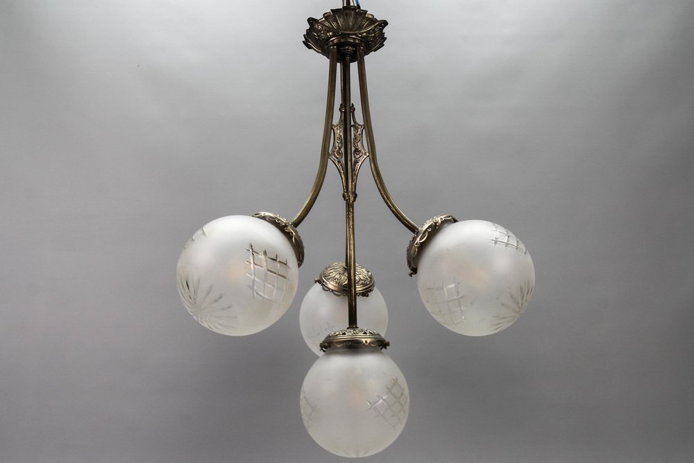 French Art Deco Four-Light Brass and Frosted Cut Glass Globe Chandelier, 1930s