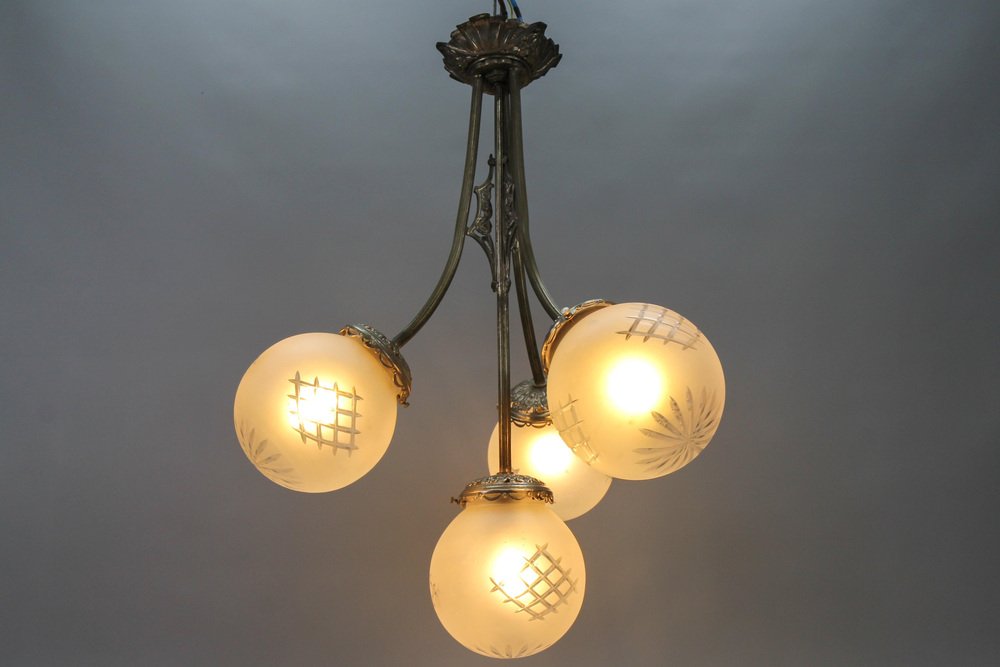 French Art Deco Four-Light Brass and Frosted Cut Glass Globe Chandelier, 1930s