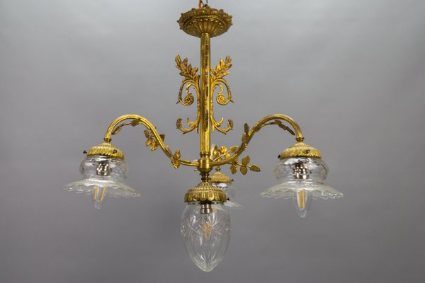 French Louis XVI Style Bronze and Clear Cut Glass Four-Light Chandelier, 1920s-KEG-1803435