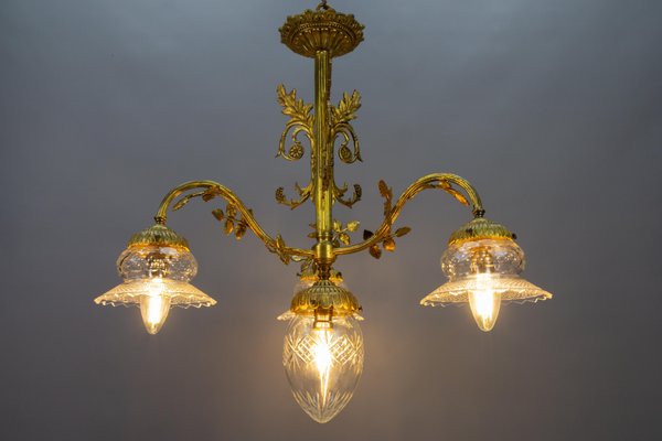 French Louis XVI Style Bronze and Clear Cut Glass Four-Light Chandelier, 1920s-KEG-1803435