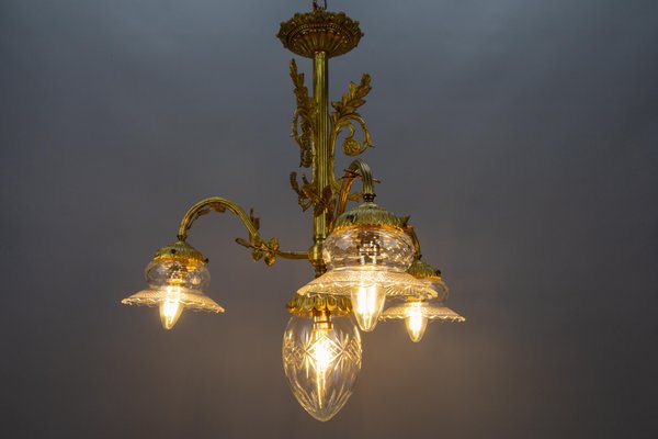 French Louis XVI Style Bronze and Clear Cut Glass Four-Light Chandelier, 1920s-KEG-1803435