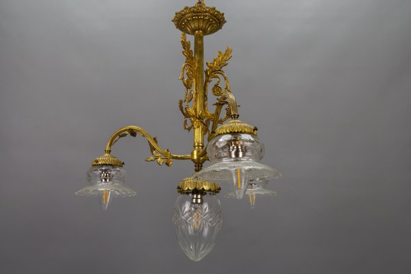 French Louis XVI Style Bronze and Clear Cut Glass Four-Light Chandelier, 1920s-KEG-1803435