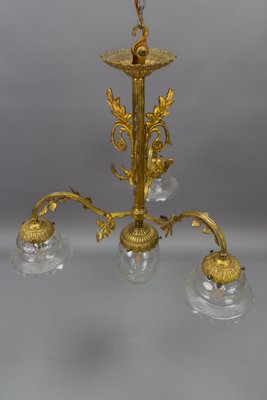 French Louis XVI Style Bronze and Clear Cut Glass Four-Light Chandelier, 1920s-KEG-1803435