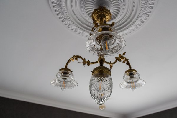 French Louis XVI Style Bronze and Clear Cut Glass Four-Light Chandelier, 1920s-KEG-1803435