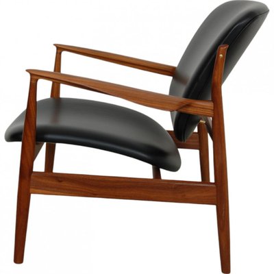 French Lounge Chair in Black Leather and Walnut by Finn Juhl-MTD-2028744