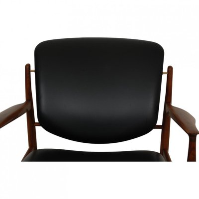 French Lounge Chair in Black Leather and Walnut by Finn Juhl-MTD-2028744