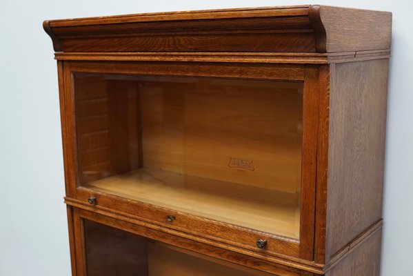 German Oak Bookcase with Folding Doors in style of Globe Wernicke, 1900s-XO-1362404