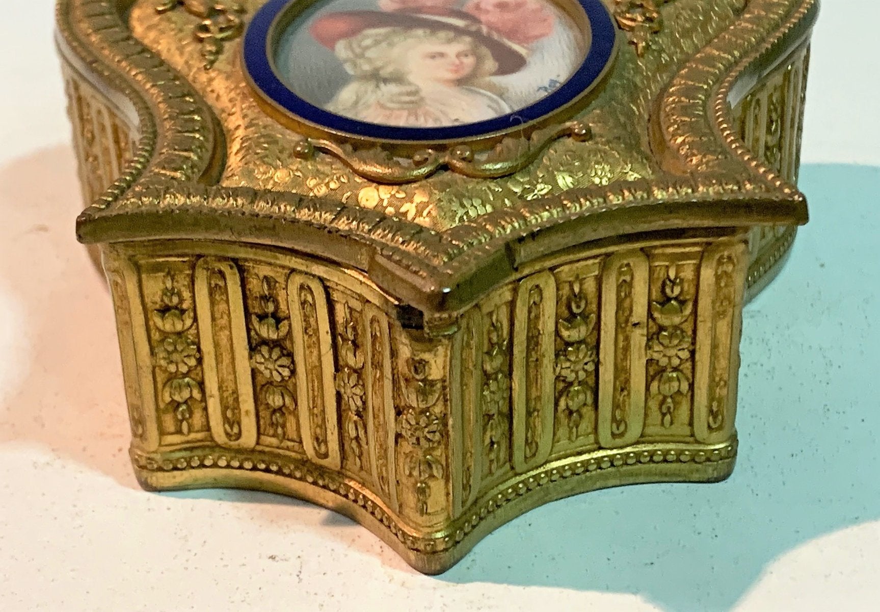 Gilt Bronze Box With Miniature Woman With Hat & Blue Enamel Border