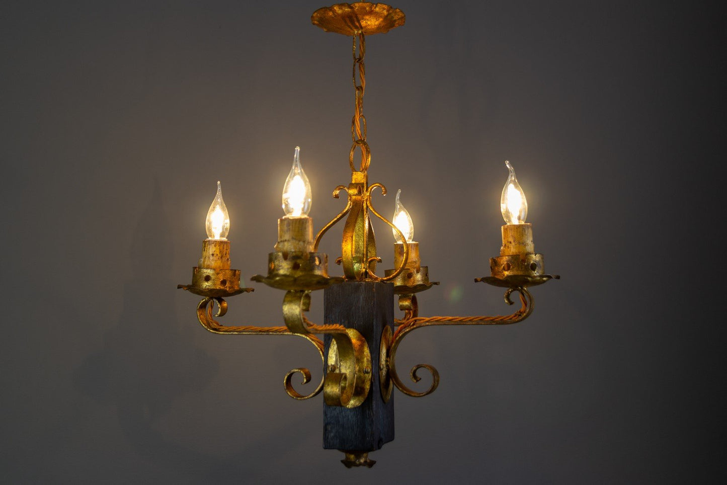 Gilt Wrought Iron and Black Wood Chandelier