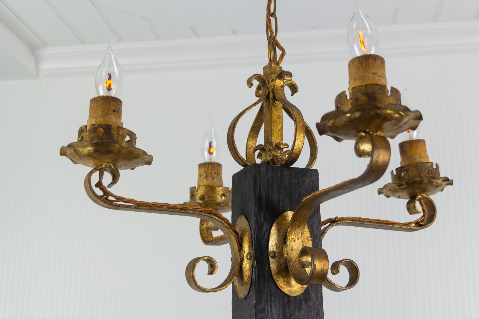 Gilt Wrought Iron and Black Wood Chandelier