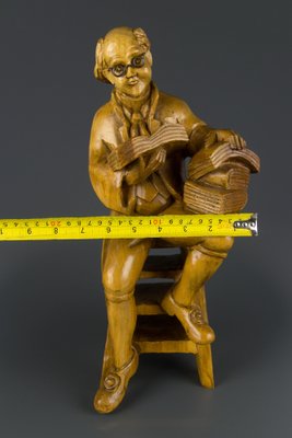 Hand Carved Wooden Figurative Sculpture of a Professor with Books-KEG-1086457