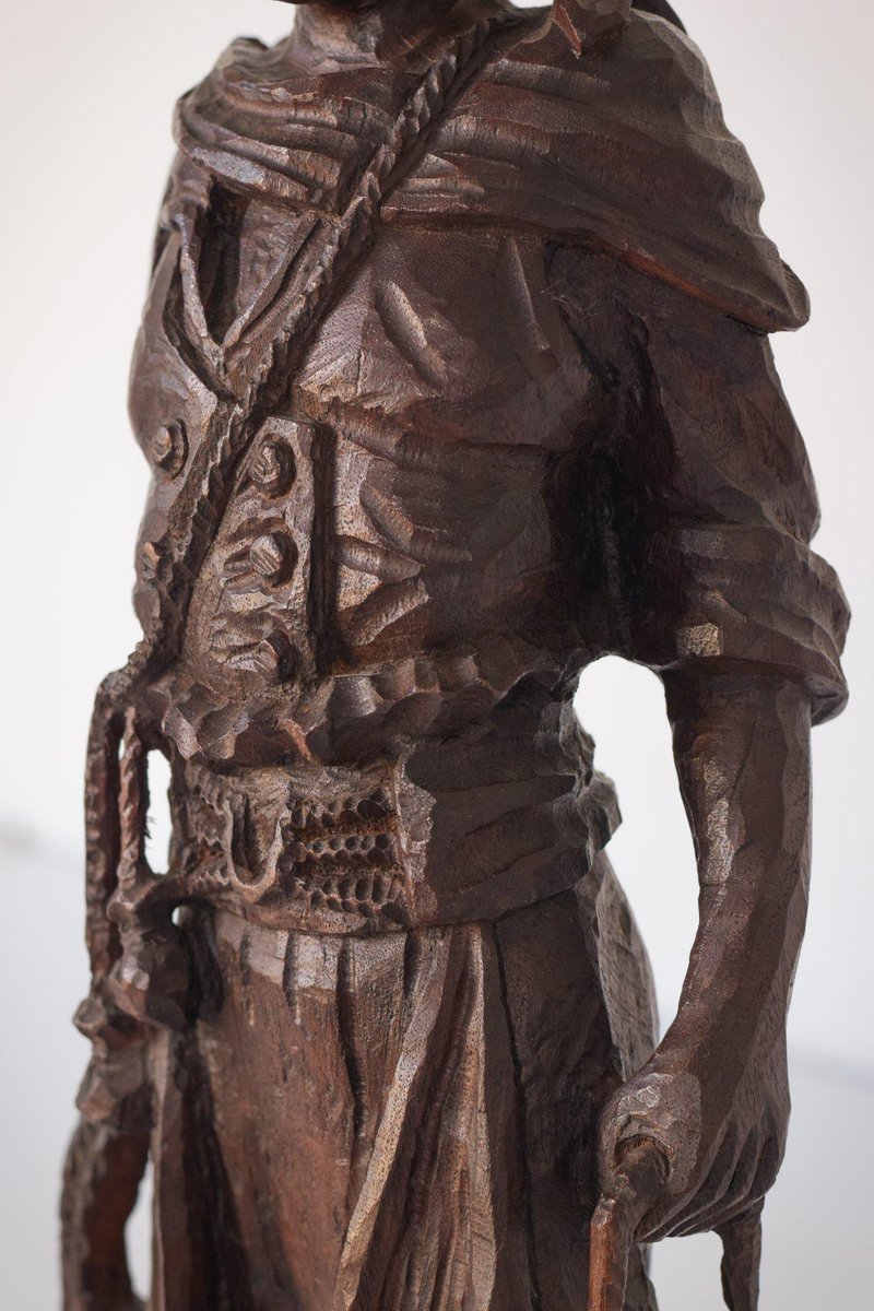 Hand-Carved Wooden Sculpture of a Male Figure