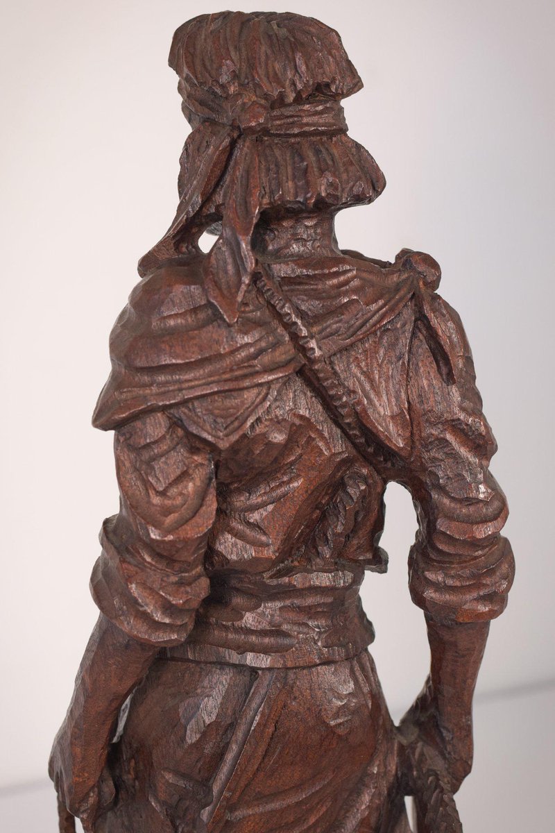 Hand-Carved Wooden Sculpture of a Male Figure