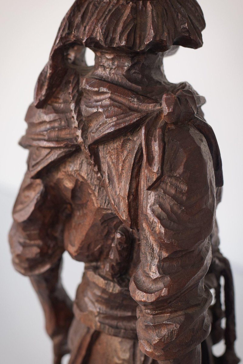 Hand-Carved Wooden Sculpture of a Male Figure