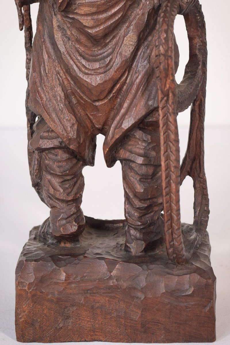 Hand-Carved Wooden Sculpture of a Male Figure