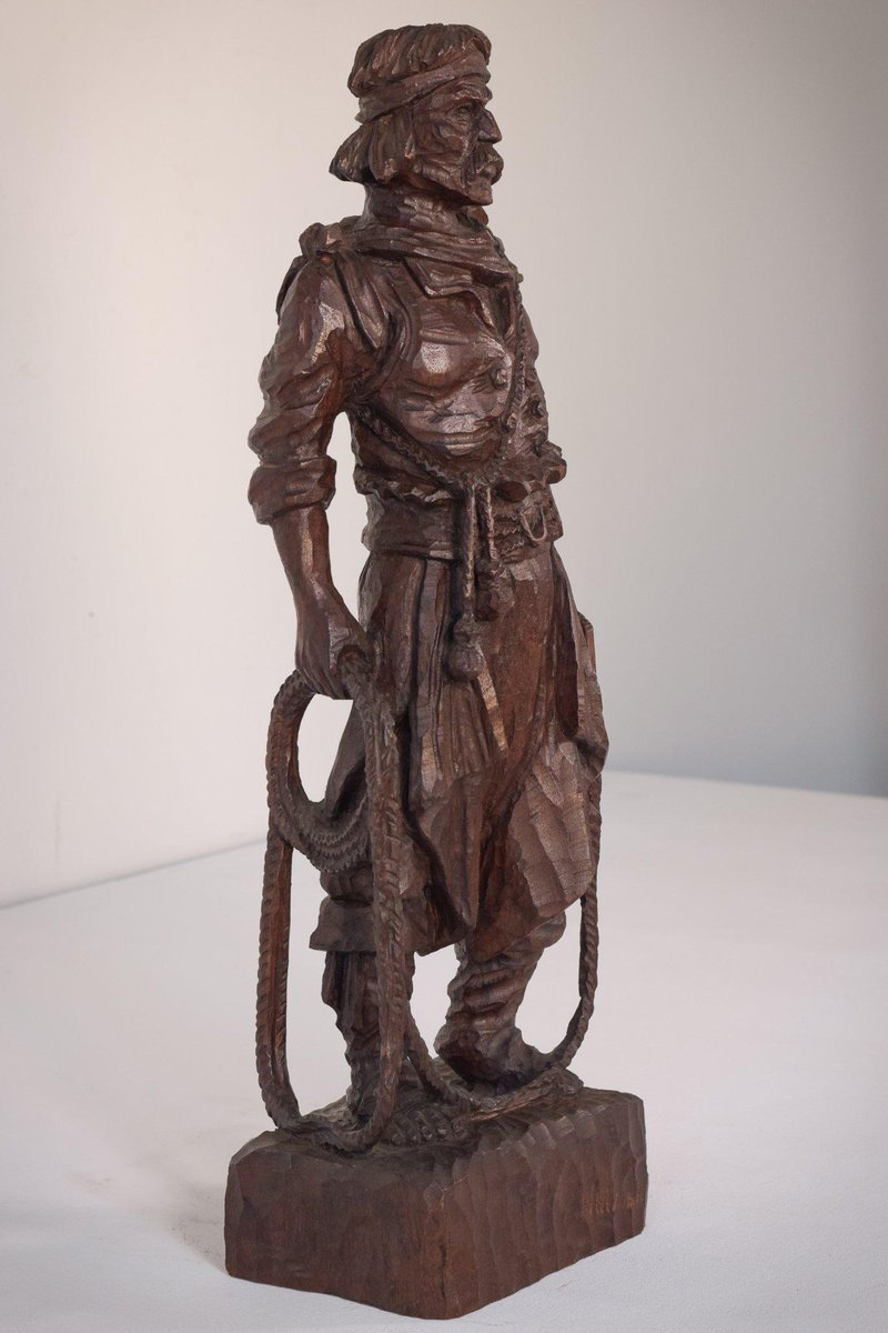 Hand-Carved Wooden Sculpture of a Male Figure