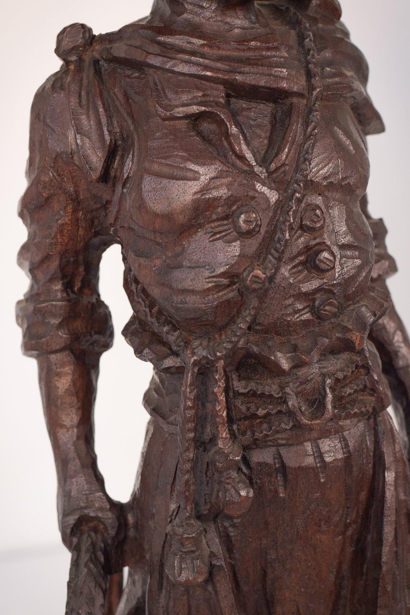 Hand-Carved Wooden Sculpture of a Male Figure