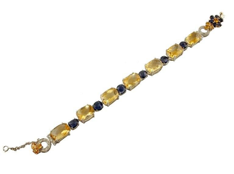 Handcrafted Bracelet with Diamonds, Sapphire, Yellow Topaz and 14 Karat White Gold.