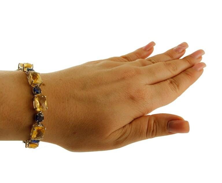 Handcrafted Bracelet with Diamonds, Sapphire, Yellow Topaz and 14 Karat White Gold.