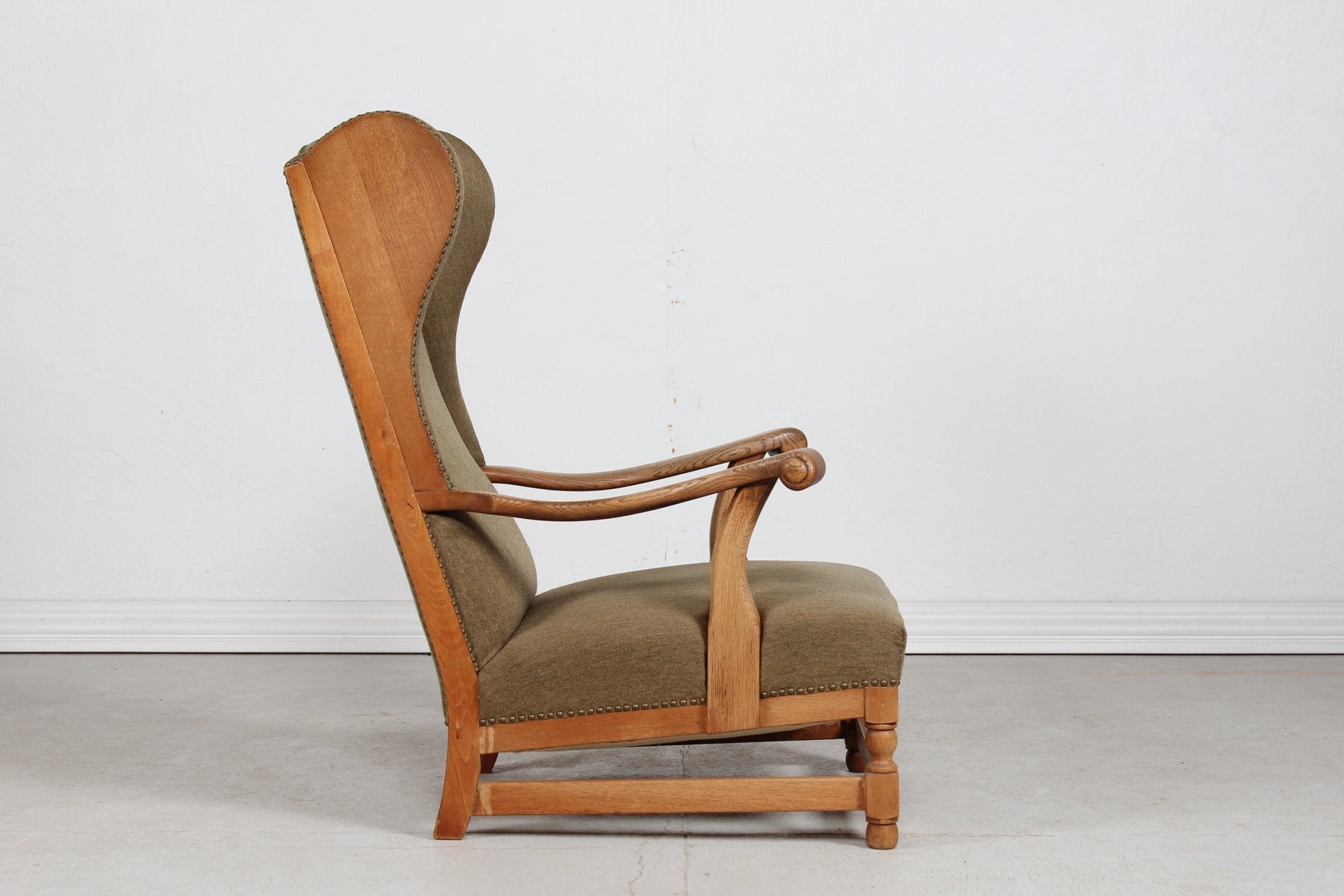 High Back King Chair in Oak with Greenish Wool by Axel Einar Hjorth, Denmark, 1940s