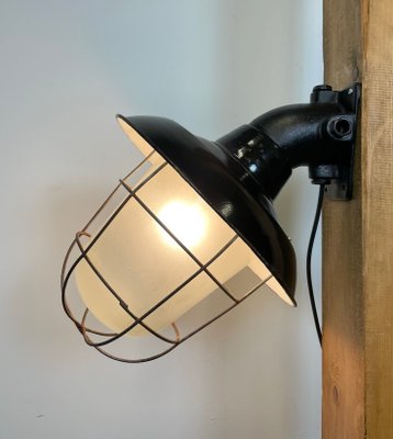 Industrial Black Enamel and Cast Iron Wall Lamp with Iron Grid, 1960s-CGF-1060326