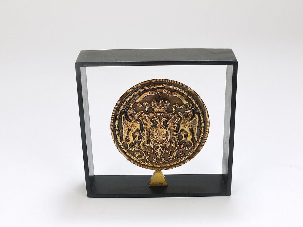 Iron & Brass Coin Medal Bookend attributed to Carl Auböck, Austria, 1970s