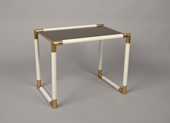 Italian Brass and Mirrored Glass Coffee Table by Tommaso Barbi, 1970s-JDR-1257977