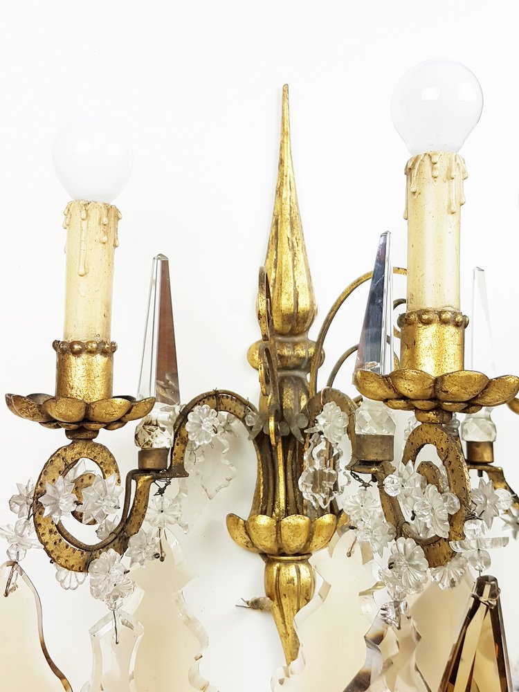 Italian Gold Leaf Metal and Faceted Crystal Sconces with Stars and Obelisks Decor, 1930s, Set of 2