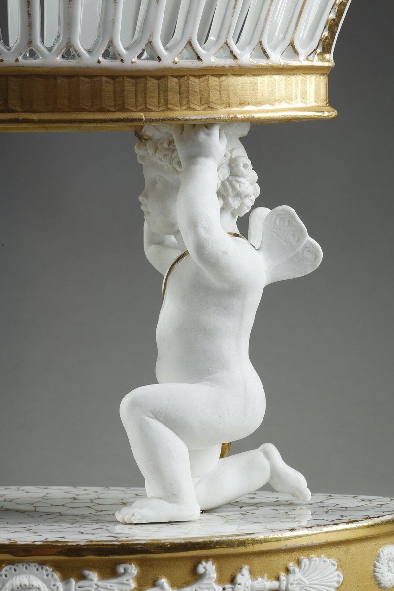 Large Basket in Paris Porcelain Resting on Two Cupids, 1830s