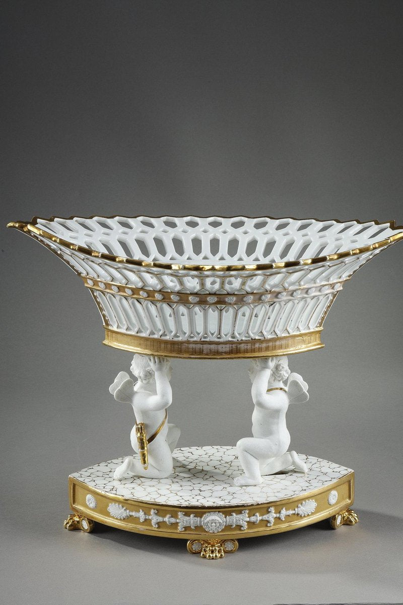 Large Basket in Paris Porcelain Resting on Two Cupids, 1830s