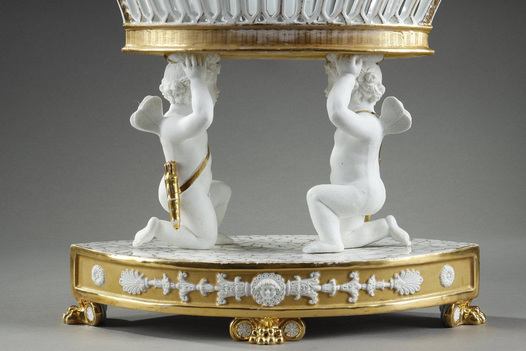 Large Basket in Paris Porcelain Resting on Two Cupids, 1830s