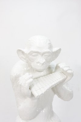 Large Sitting Chimpanzee Playing the Panpipes, 1974-GCG-645794