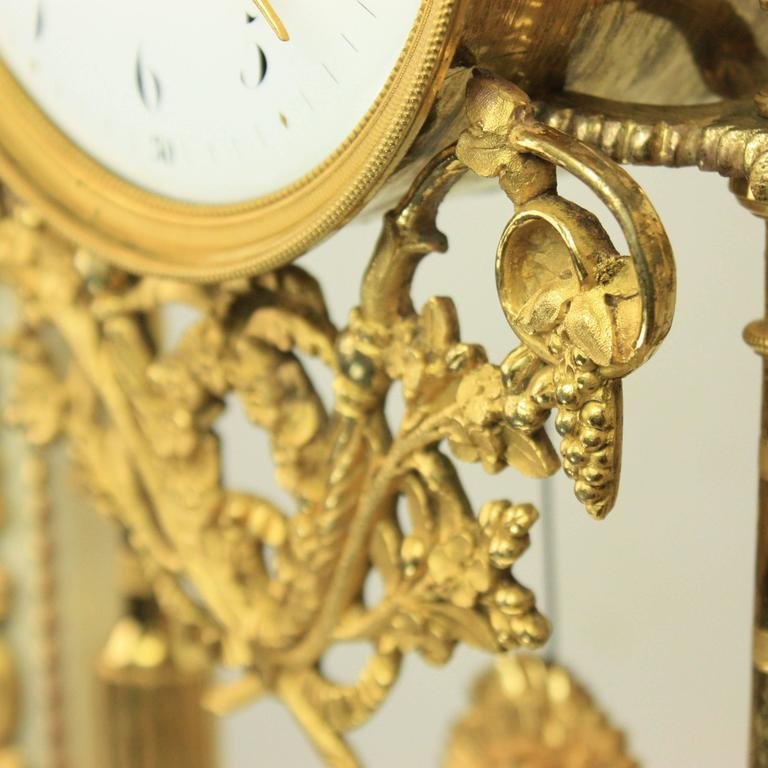 Late-18th Century Louis XVI Carrara and Black Marble Ormolu Portico Mantle Clock