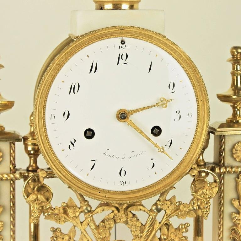 Late-18th Century Louis XVI Carrara and Black Marble Ormolu Portico Mantle Clock