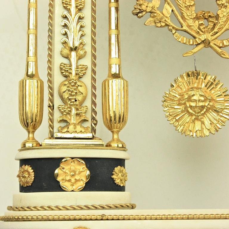 Late-18th Century Louis XVI Carrara and Black Marble Ormolu Portico Mantle Clock