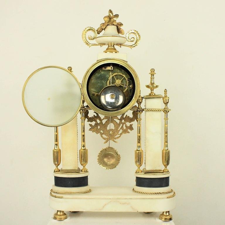 Late-18th Century Louis XVI Carrara and Black Marble Ormolu Portico Mantle Clock