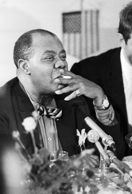 Louis Armstrong Smoking a Cigarette, Berlin, 1965-DYV-2018780