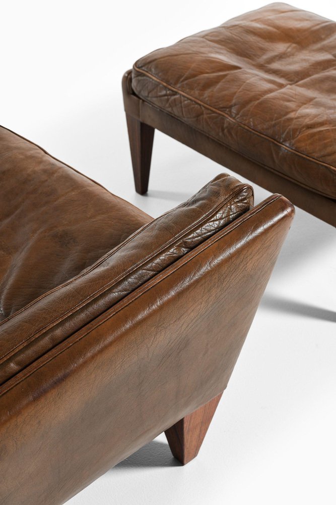 Lounge Chair and Stool in Rosewood and Brown Leather attributed to Illum Wikkelsø, 1960s, Set of 2