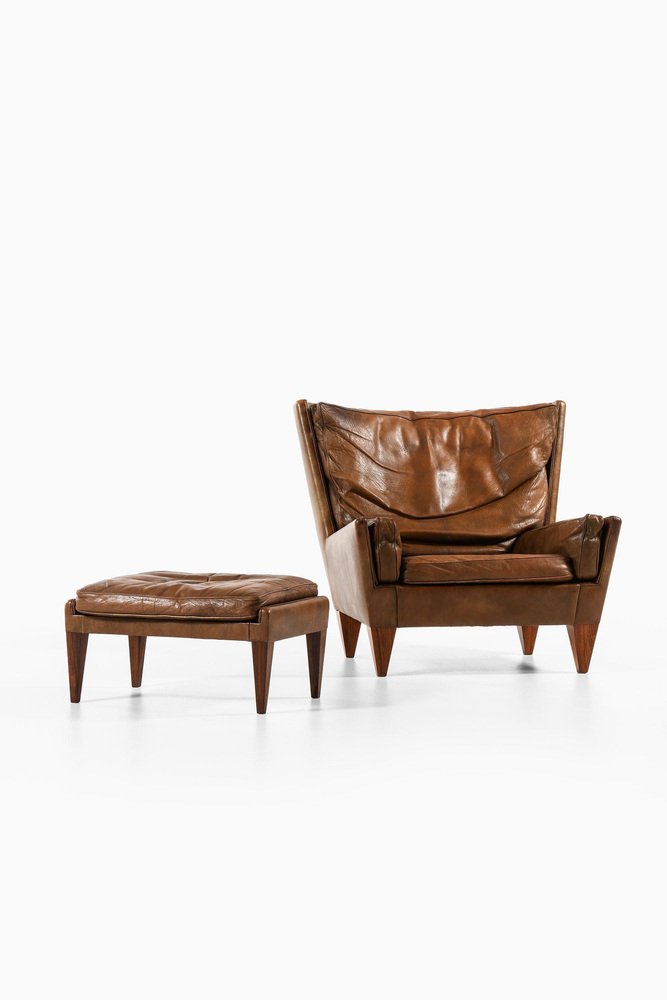 Lounge Chair and Stool in Rosewood and Brown Leather attributed to Illum Wikkelsø, 1960s, Set of 2