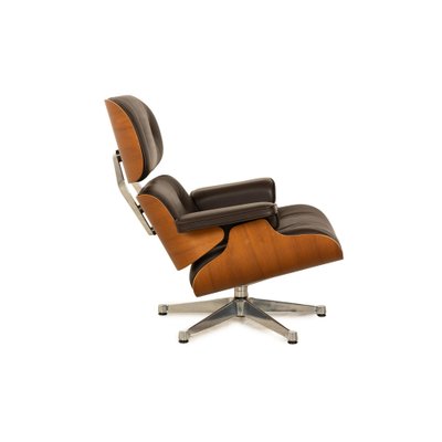 Lounge Chair Leather Armchair in Brown with Stool by Charles & Ray Eames for Vitra-RQW-2036327