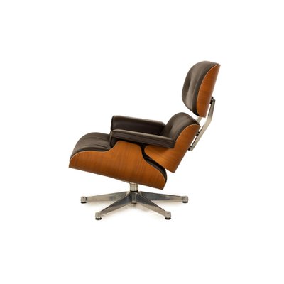 Lounge Chair Leather Armchair in Brown with Stool by Charles & Ray Eames for Vitra-RQW-2036327