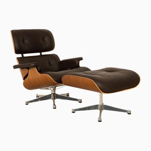 Lounge Chair Leather Armchair in Brown with Stool by Charles & Ray Eames for Vitra-RQW-2036327